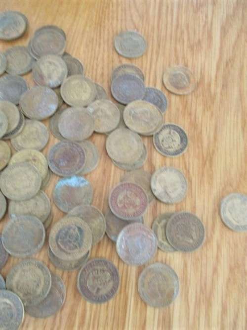 A VINTAGE "DAINTY MISS CHOCOLATES" TIN FILLED WITH OVER A HUNRED OLD 1/2 CENT COINS (LARGER SIZE)