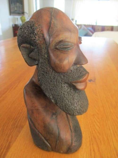 TWO DETAILED HAND CARVED WOODEN AFRICAN BUST SCULPTURES - HEAVY SO WOULD BE GREAT AS BOOKENDS TOO!