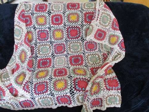 A LARGE UNUSUAL CROCHETED BLANKET (WITH WHITE INSTEAD OF BLACK BACKGROUND) - 205CM X 140CM