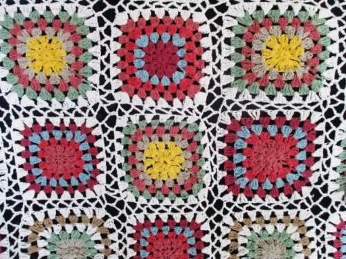 A LARGE UNUSUAL CROCHETED BLANKET (WITH WHITE INSTEAD OF BLACK BACKGROUND) - 205CM X 140CM