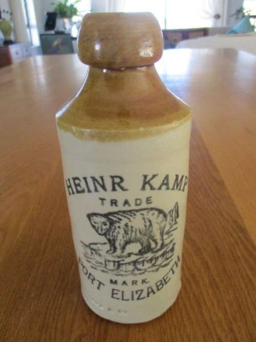 AN ANTIQUE STONEWARE GINGER BEER BOTTLE - HEINR KAMP PORT ELIZABETH - CIRCA 1914 TO 1919