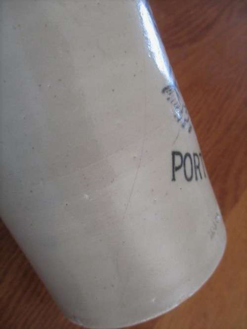 AN ANTIQUE STONEWARE GINGER BEER BOTTLE - HEINR KAMP PORT ELIZABETH - CIRCA 1914 TO 1919