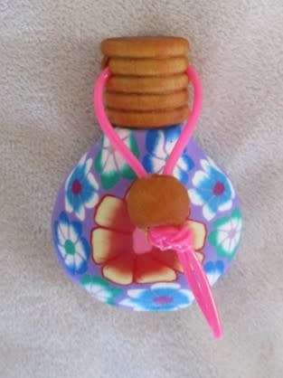 TWO PRETTY PERFUME BOTTLES WITH WOODEN LIDS TO ADD TO YOUR COLLECTION