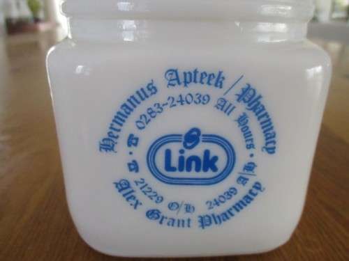VINTAGE 1980's MILK GLASS APOTHECARY JAR -  ALEX GRANT PHARMACY, HERMANUS (WITH OLD 9 DIGIT TEL.NO.)