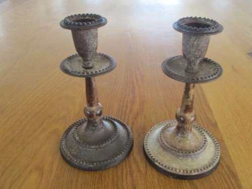 TWO OLD METAL CANDLESTICKS MADE IN INDIA WITH LOADS OF CHARACTER
