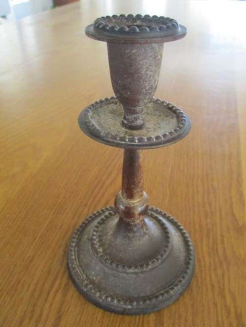 TWO OLD METAL CANDLESTICKS MADE IN INDIA WITH LOADS OF CHARACTER