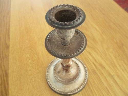 TWO OLD METAL CANDLESTICKS MADE IN INDIA WITH LOADS OF CHARACTER