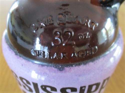 NOT USUALLY FOUND IN S.A. - A 2013 MISSISSIPPI MUD ONE QUART BEER BOTTLE - GREAT BAR DISPLAY!