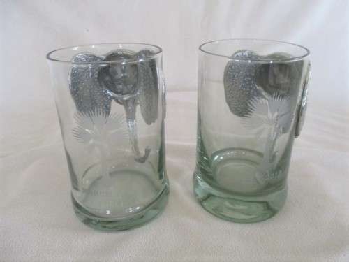 FOR SOMARI ONLY - NGWENYA GLASS PITCHER AND TWO BEER GLASSES WITH PEWTER ELEPHANT HEAD HANDLES