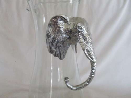 FOR SOMARI ONLY - NGWENYA GLASS PITCHER AND TWO BEER GLASSES WITH PEWTER ELEPHANT HEAD HANDLES