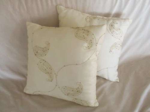 TWO LOVELY, LIGHT CREAM  EMBROIDERED AND SEQUINED CUSHIONS