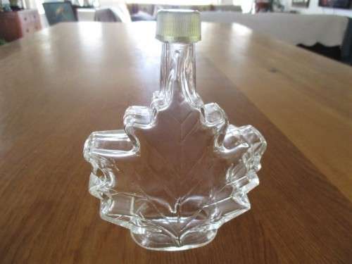 PRETTY AND UNUSUAL -  CANADIAN MAPLE LEAF SHAPED BOTTLE