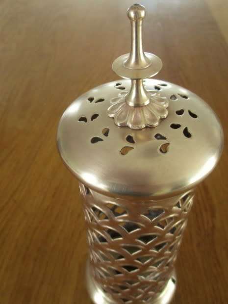 A VERY DECORATIVE BRASS CANDLE LANTERN