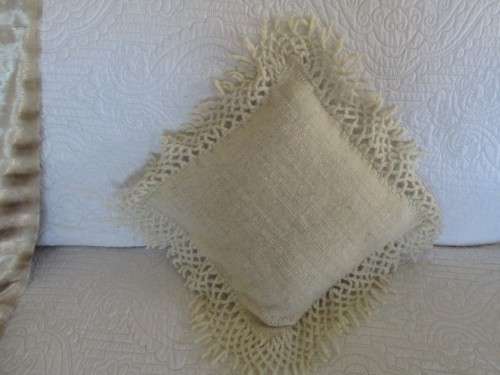 A  LOVELY MOHAIR CUSHION WITH CROTCHETED BORDER