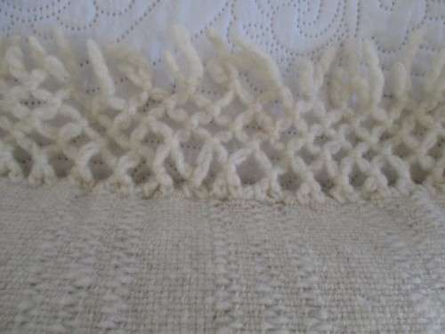 A  LOVELY MOHAIR CUSHION WITH CROTCHETED BORDER