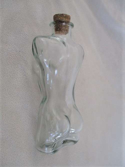 TWO UNUSUAL MALE AND FEMALE TORSO LUTEX GLASS BOTTLES