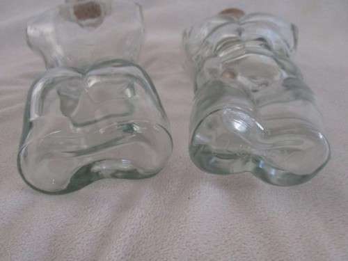 TWO UNUSUAL MALE AND FEMALE TORSO LUTEX GLASS BOTTLES