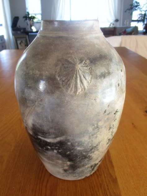 THERE IS SOMETHING SO NOT AVERAGE ABOUT THIS LARGE, HEAVY, BEAUTIFULLY GLAZED VASE