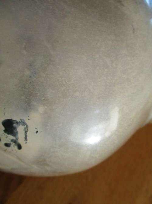 THERE IS SOMETHING SO NOT AVERAGE ABOUT THIS LARGE, HEAVY, BEAUTIFULLY GLAZED VASE