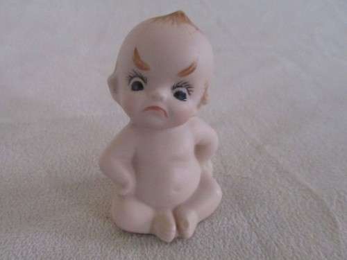 THIS CUTE LITTLE VINTAGE BISQUE KEWPIE IS NOT HAPPY!!