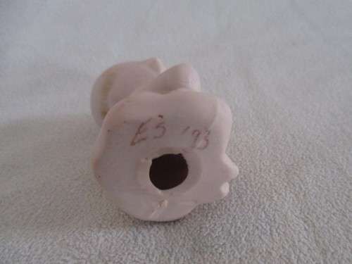 THIS CUTE LITTLE VINTAGE BISQUE KEWPIE IS NOT HAPPY!!