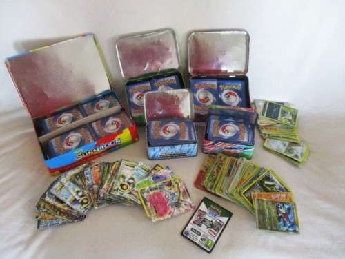 ONE BID FOR ALL - OVER 1200 POKEMON CARDS WITH 66 FOIL, 77 HOLO, 1 "REDEEM YOUR REWARDS", AND 5 TINS