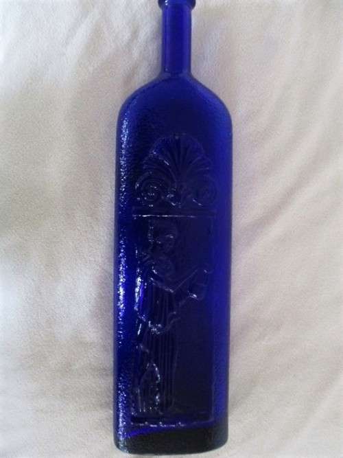A TALL, UNUSUAL VINTAGE BLUE BOTTLE DEPICTING GRECIAN LADY