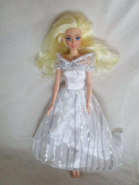 A VERY PRETTY BARBIE CLONE DOLL WITH BEAUTIFUL HAIR