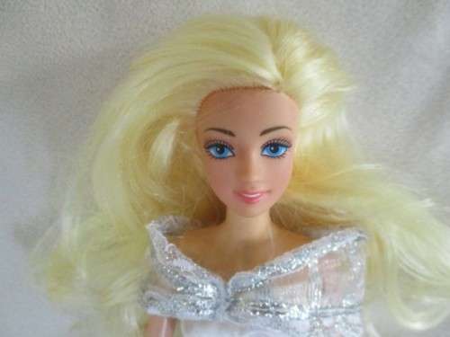 A VERY PRETTY BARBIE CLONE DOLL WITH BEAUTIFUL HAIR