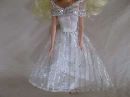 A VERY PRETTY BARBIE CLONE DOLL WITH BEAUTIFUL HAIR