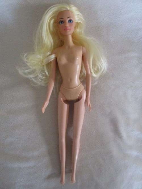 A VERY PRETTY BARBIE CLONE DOLL WITH BEAUTIFUL HAIR