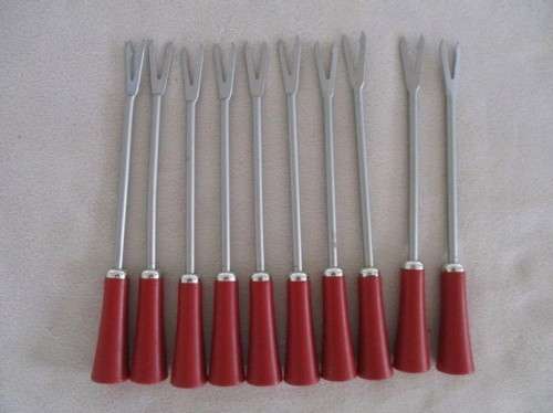 A SET OF TEN HANDY PICKLE/OLIVE FORKS IN GREAT CONDITION