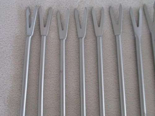 A SET OF TEN HANDY PICKLE/OLIVE FORKS IN GREAT CONDITION