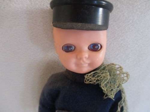 A SMALL  VINTAGE ROSEBUD, ENGLAND DOLL - CORNWALL FISHERMAN IN ORIGINAL OUTFIT WITH FISH AND NET