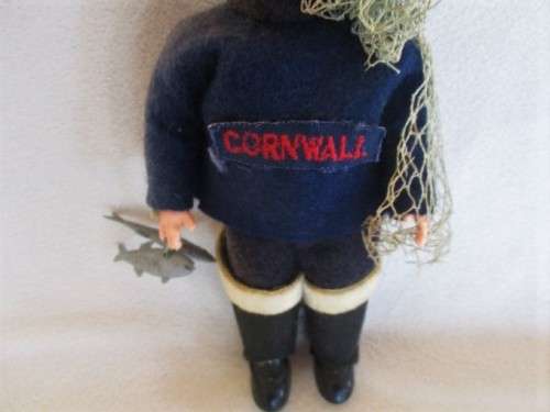A SMALL  VINTAGE ROSEBUD, ENGLAND DOLL - CORNWALL FISHERMAN IN ORIGINAL OUTFIT WITH FISH AND NET
