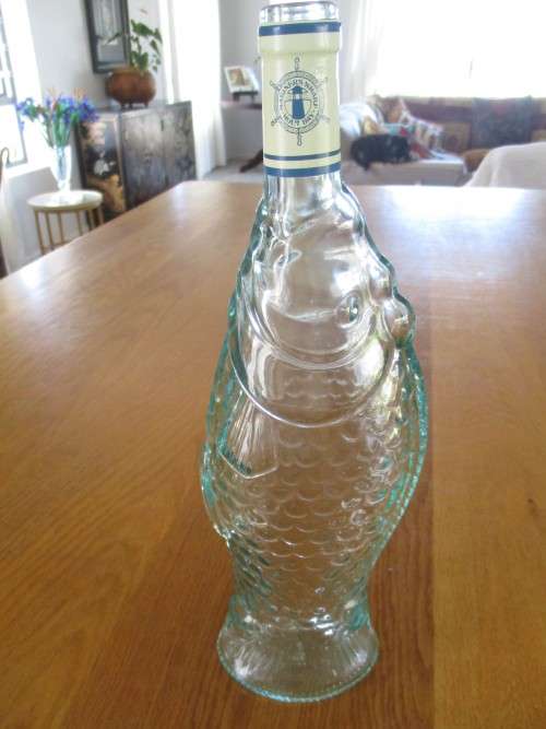 VINTAGE FISH-SHAPED BOTTLE FROM MARINER`S WHARF HOUT BAY