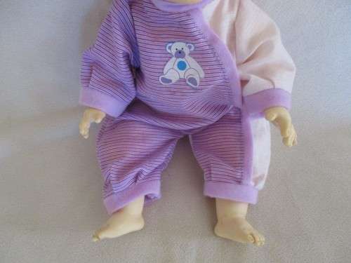 A CUTE BUT NOT PERFECT VINTAGE DOLL