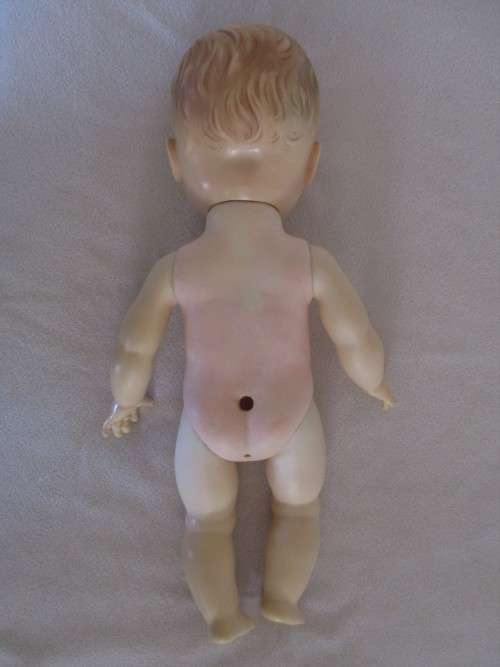 A CUTE BUT NOT PERFECT VINTAGE DOLL