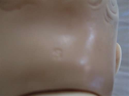 A CUTE BUT NOT PERFECT VINTAGE DOLL