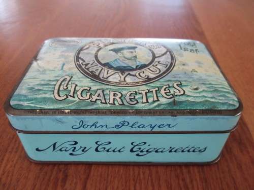 AN OLD JOHAN PLAYERS NAVY CUT CIGARETTE TIN