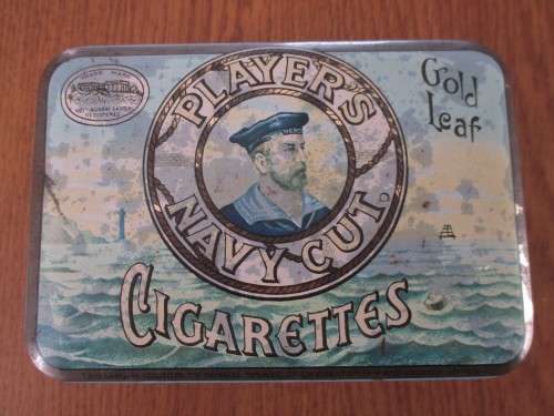 AN OLD JOHAN PLAYERS NAVY CUT CIGARETTE TIN
