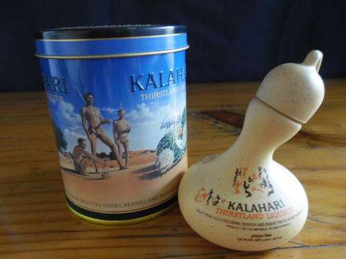 A SMALL KALAHARI THIRSTLAND LIQUER BOTTLE IN TIN - TOO CUTE!!!!