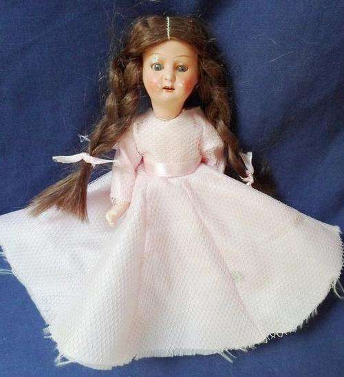 AND NOW FOR SOMETHING REALLY OUT OF THE ATTIC : A VERY OLD GERMAN BISQUE DOLLY!!