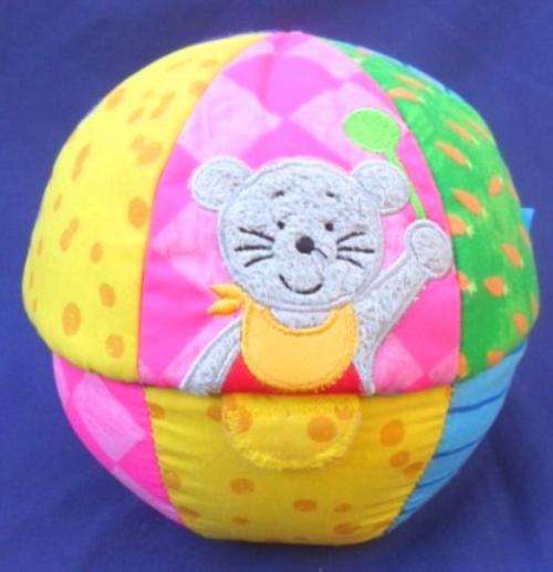 A PRETTY  'OPEN AND CLOSE' MATERIAL 'RATTLE BALL'  PLUS TWO WEE TOYS !!