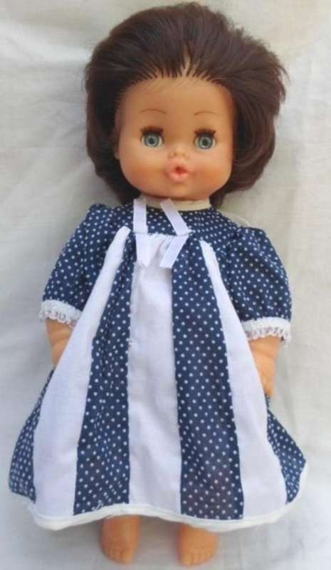 A BEAUTIFUL VINTAGE DOLL WITH OPEN AND CLOSE EYES!!
