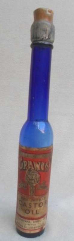 ANTIQUE COBALT BLUE 'GRANTS CASTOR OIL' BOTTLE  SEALED WITH CONTENTS AND ORIGINAL LABEL - RARE!!