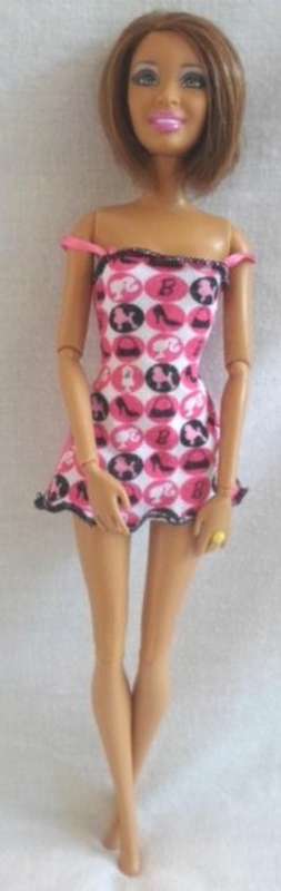 GORGEOUS 2009 BROWN EYED,TANNED, SHORT HAIR MATTEL BARBIE WITH ORIGINAL RING!!