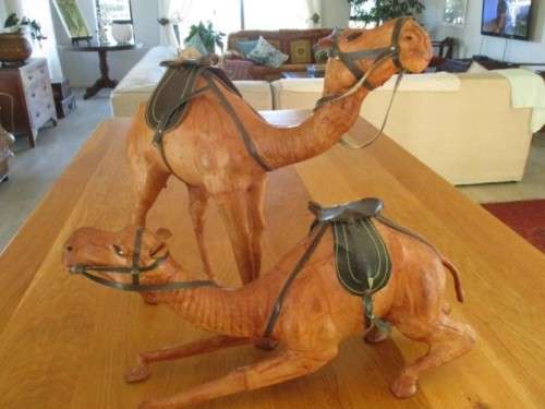 TWO ENORMOUS VINTAGE LEATHER CLAD MIDDLE EASTERN CAMELS