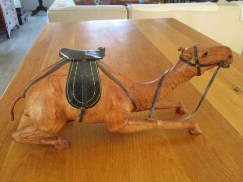 TWO ENORMOUS VINTAGE LEATHER CLAD MIDDLE EASTERN CAMELS