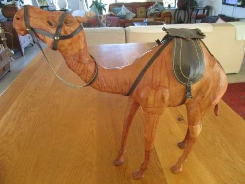 TWO ENORMOUS VINTAGE LEATHER CLAD MIDDLE EASTERN CAMELS